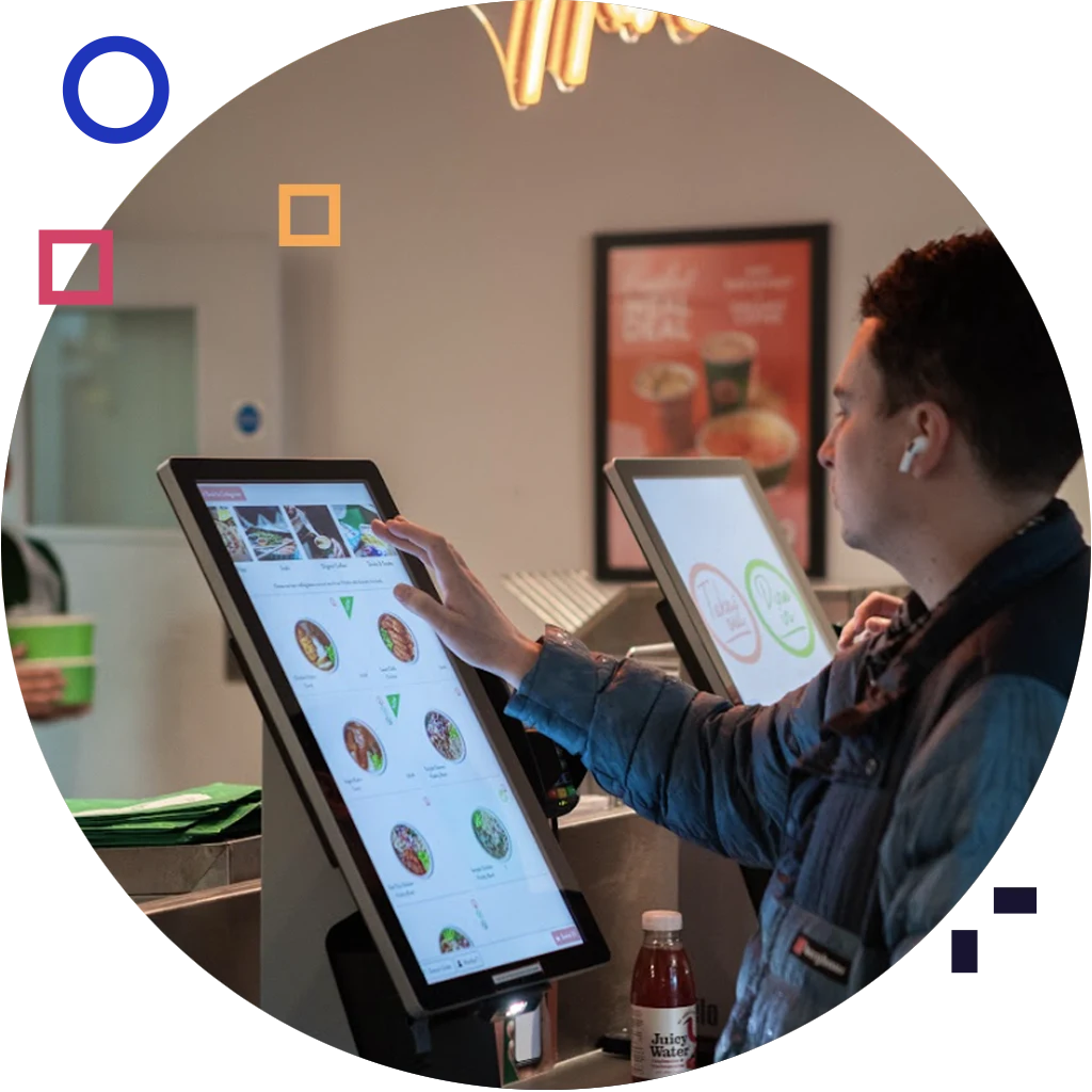 customer using self serve kiosks